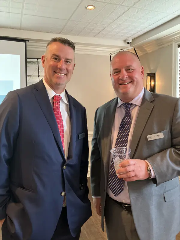 Lending Officer Rob Bender with another guest