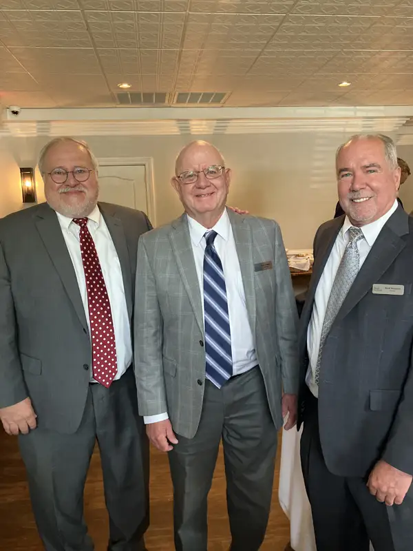 Three men at the meeting