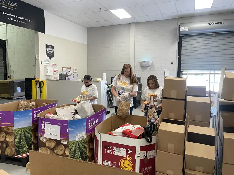 Group of people working in the warehouse