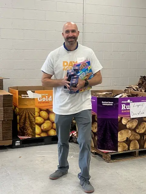 Employee Tim at Day of Action food bank