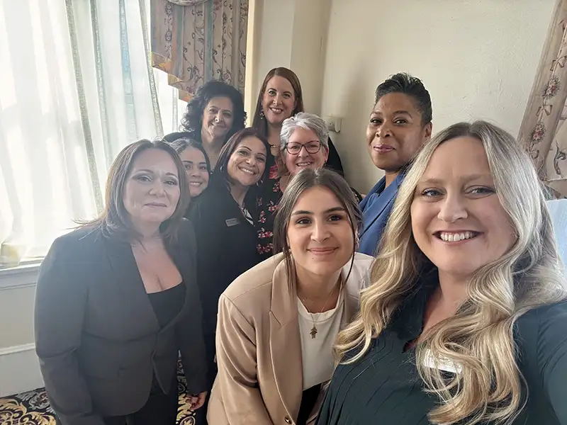 A group selfie picture of adults