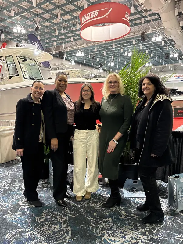 Group of 5 employees posing at the gala.