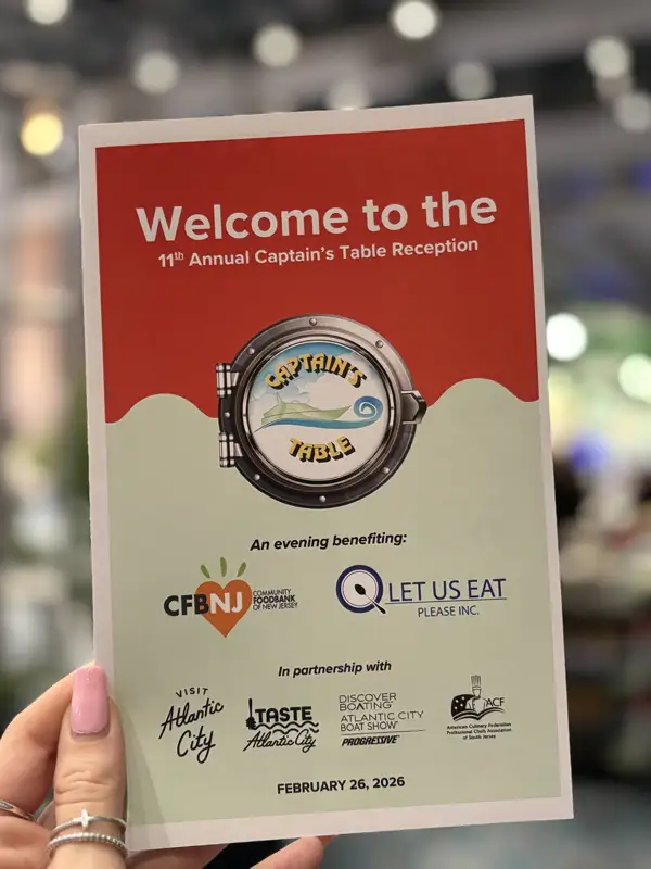 Woman holding the banquet program.